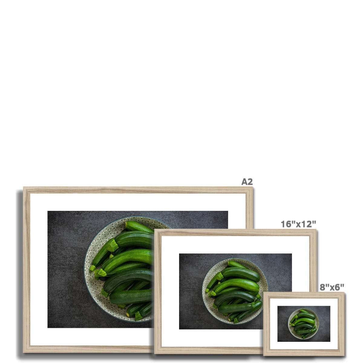 Bowl of green courgettes Framed & Mounted Print