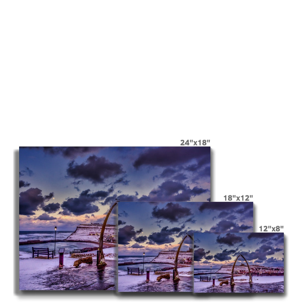 Whalebone Arch and view of Whitby Abbey in snow, Whitby, UK. Canvas