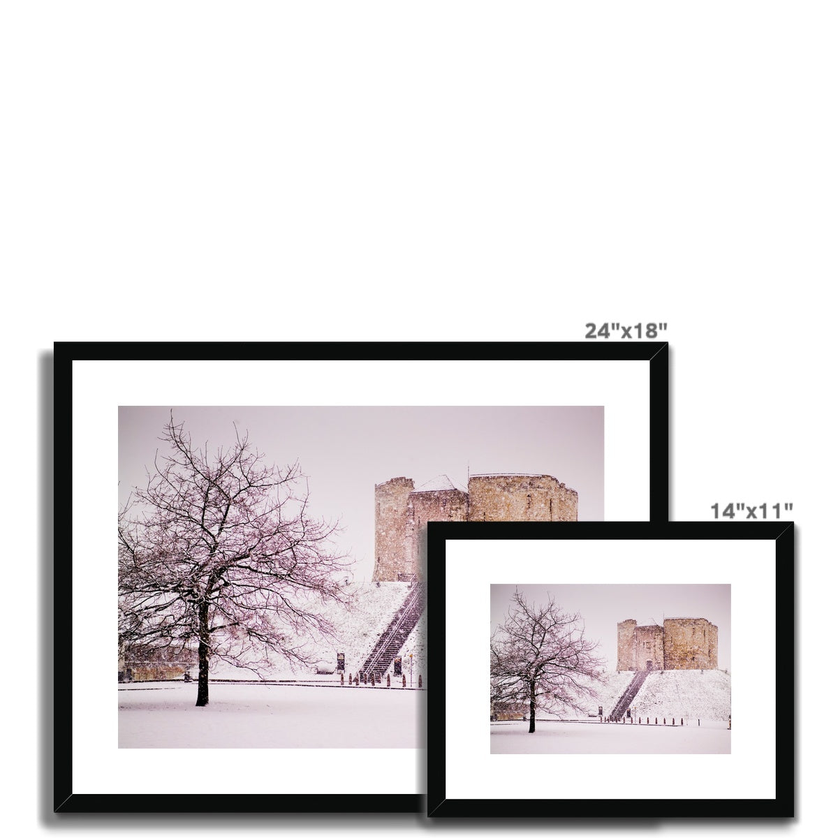 Clifford's Tower in snow blizzard, York, UK Framed & Mounted Print