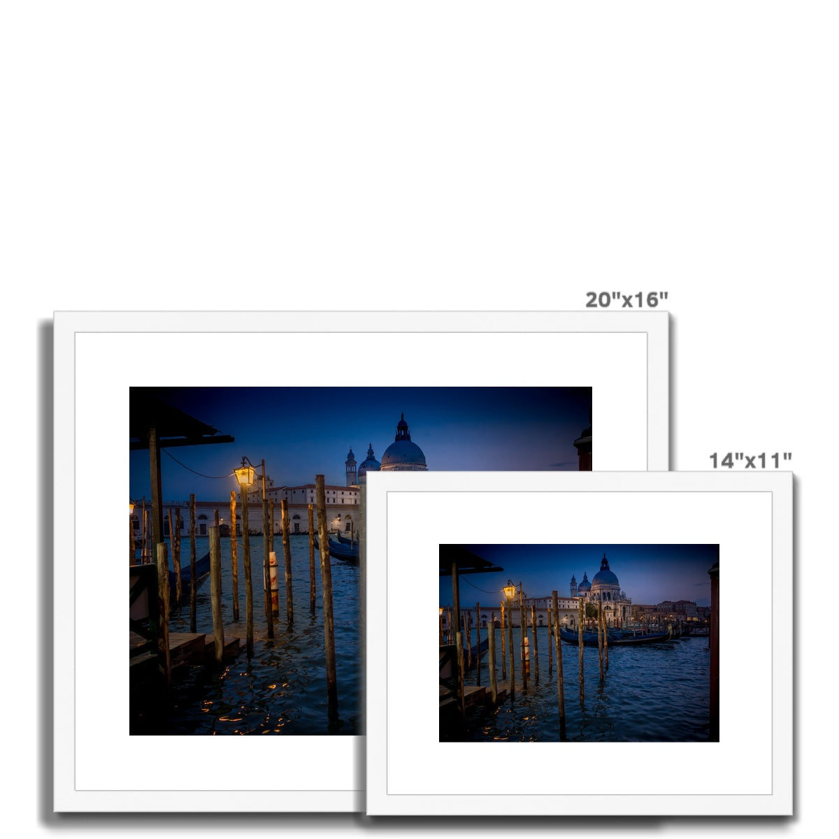 Gondolas moored for the night on the Grand Canal with the church of Santa Maria della Salute in the background. Venice, Italy. - Framed & Mounted Print