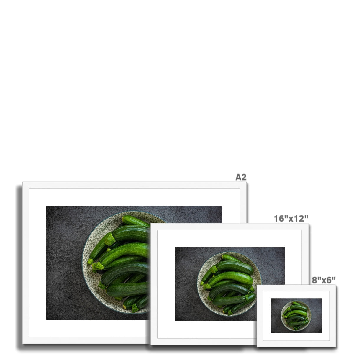 Bowl of green courgettes Framed & Mounted Print