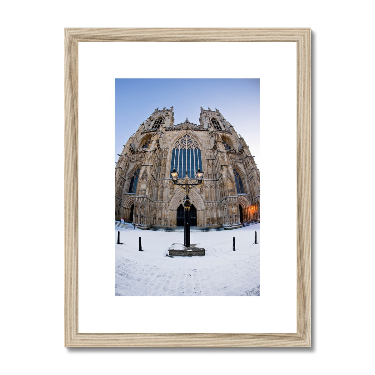 Fish eye shot of the West front of York Minster in snow Framed & Mounted Print