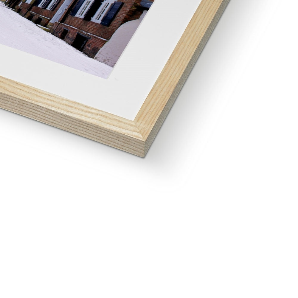 York Minster in the snow seen from Precentors Court. York, UK. Framed & Mounted Print