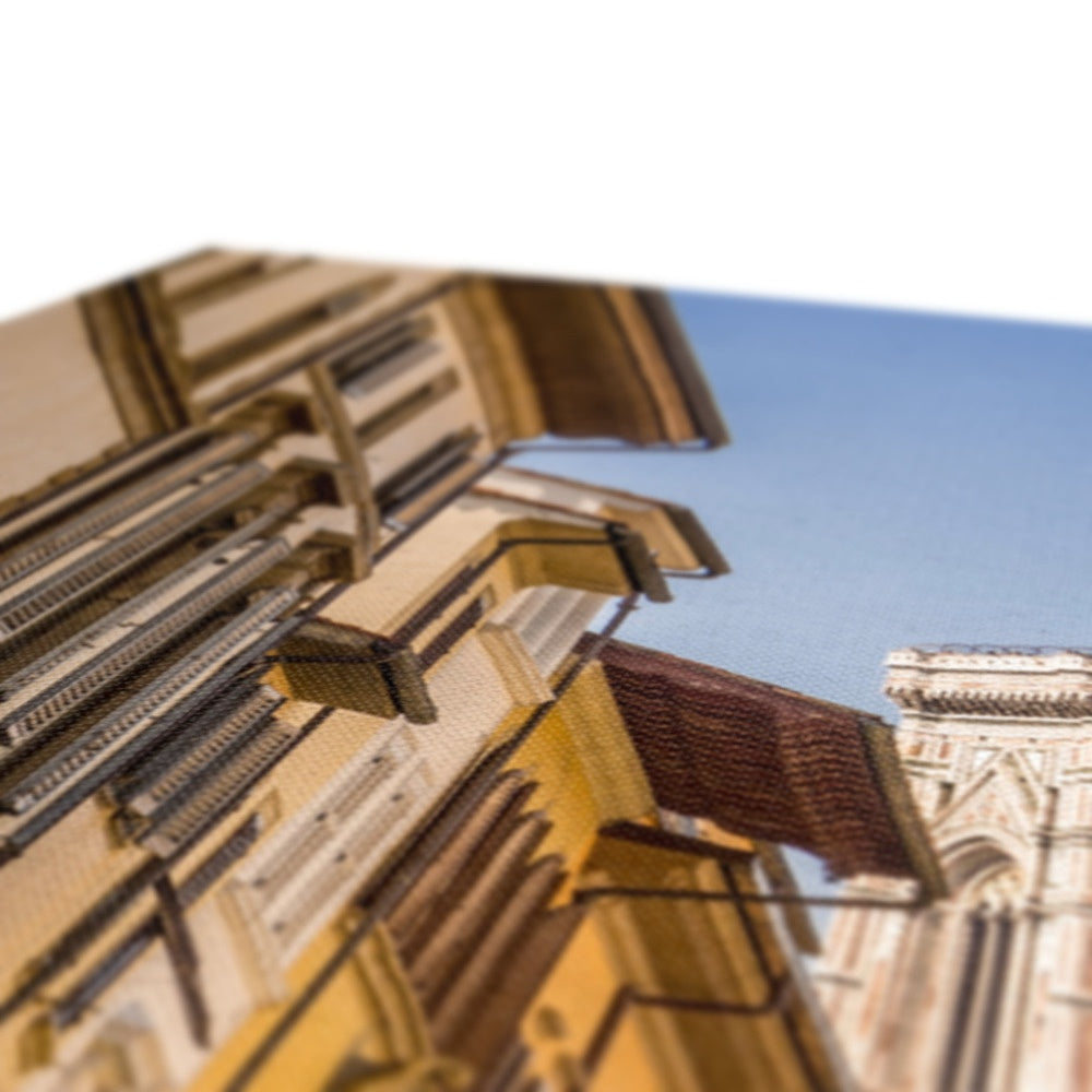 Giotto's Campanile glimpsed between buildings in the city of Florence, Italy. Canvas
