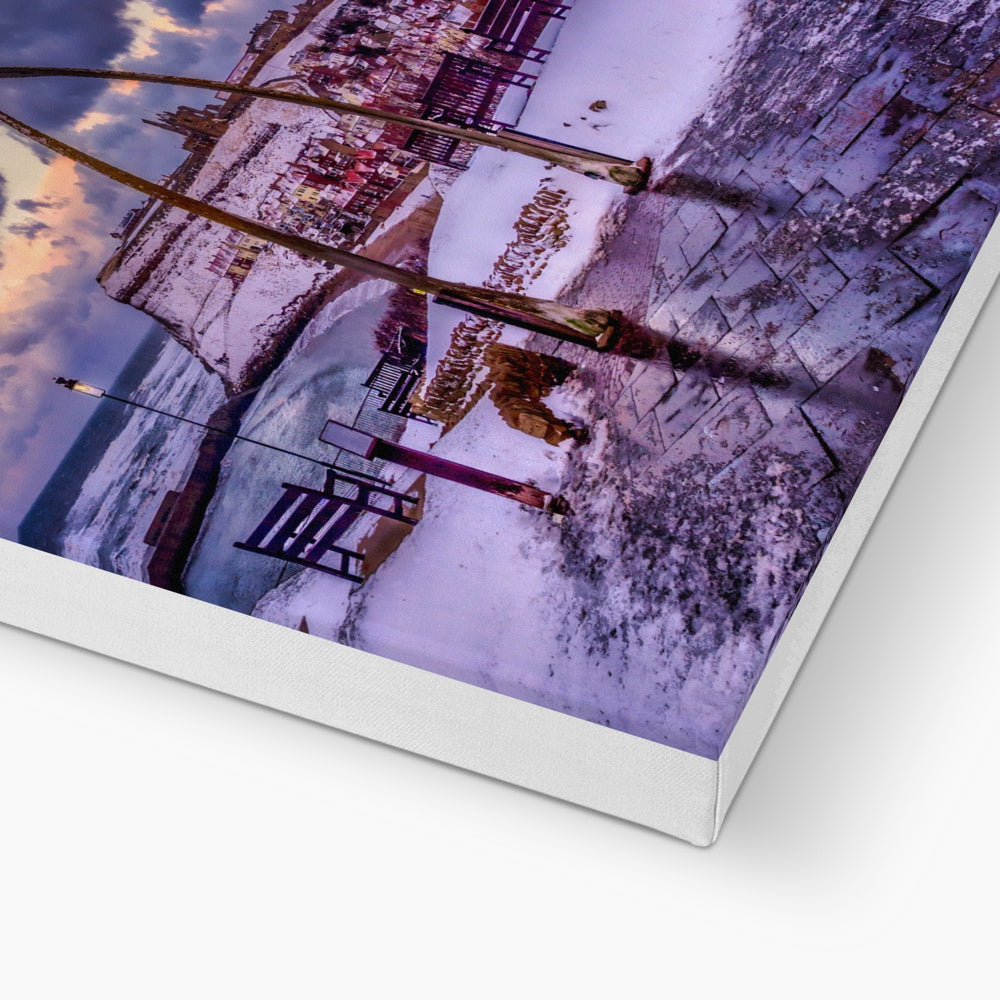 Whalebone Arch and view of Whitby Abbey in snow, Whitby, UK. Canvas