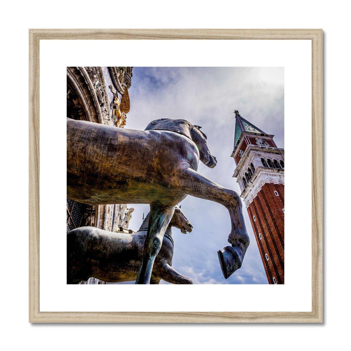 Horses of Saint Mark statues on the balcony of St Marks's basilica in Venice, Italy. Framed & Mounted Print