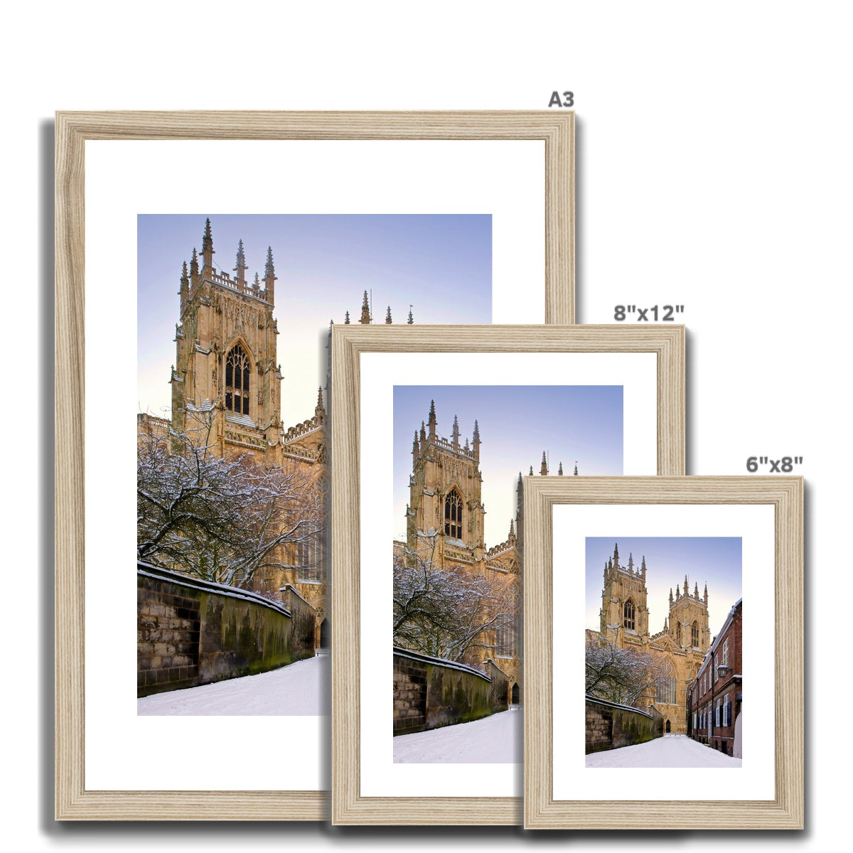 York Minster in the snow seen from Precentors Court. York, UK. Framed & Mounted Print