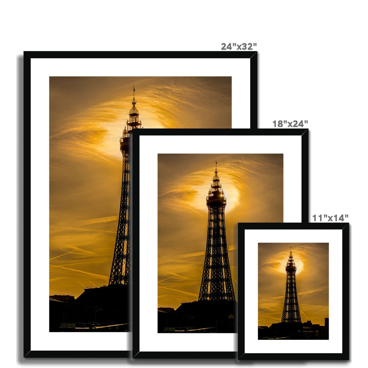 Blackpool Tower silhouetted against morning sunlight. UK. Framed & Mounted Print