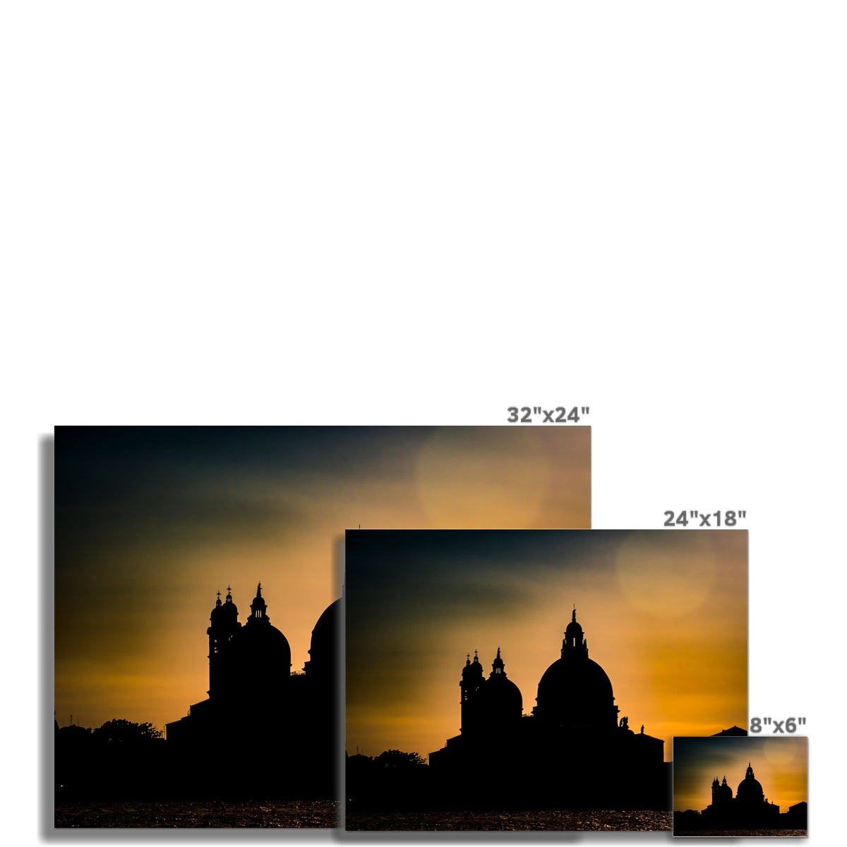 Silhouette of Santa Maria della Salute on the Grand Canal in Venice against a golden sky at sunset. Italy. Fine Art Print