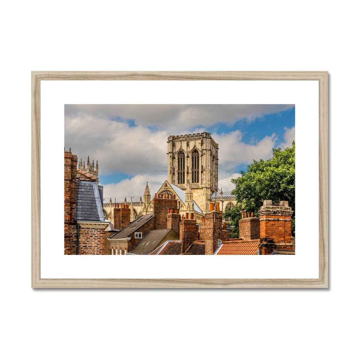 York Minster stands timeless amidst the city's rooftops. York. UK Framed & Mounted Print