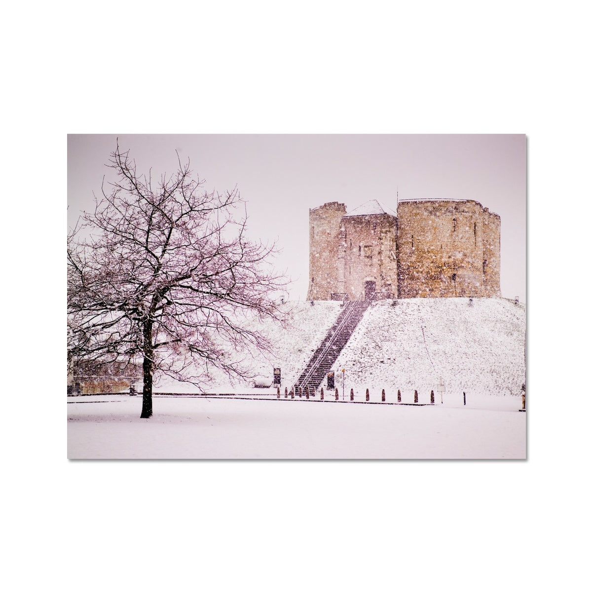 Clifford's Tower in snow blizzard, York, UK Fine Art Print