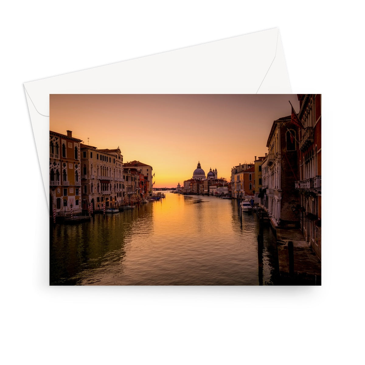 Grand Canal with Santa Maria della Salute in the distance at sunrise. Venice, Italy. Greeting Card