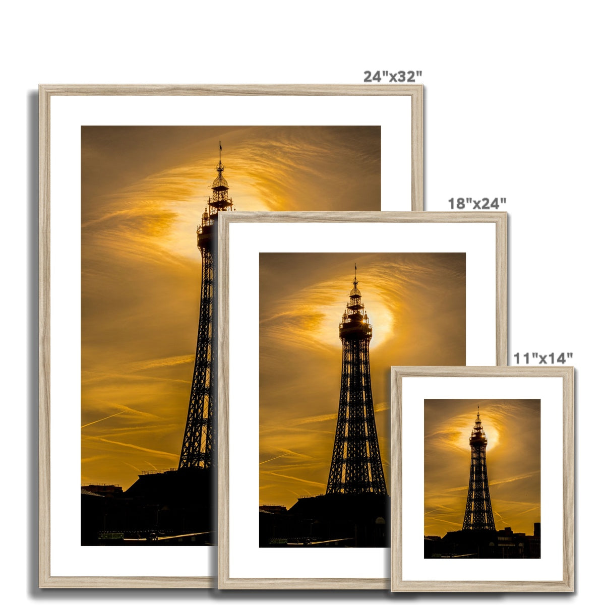 Blackpool Tower silhouetted against morning sunlight. UK. Framed & Mounted Print