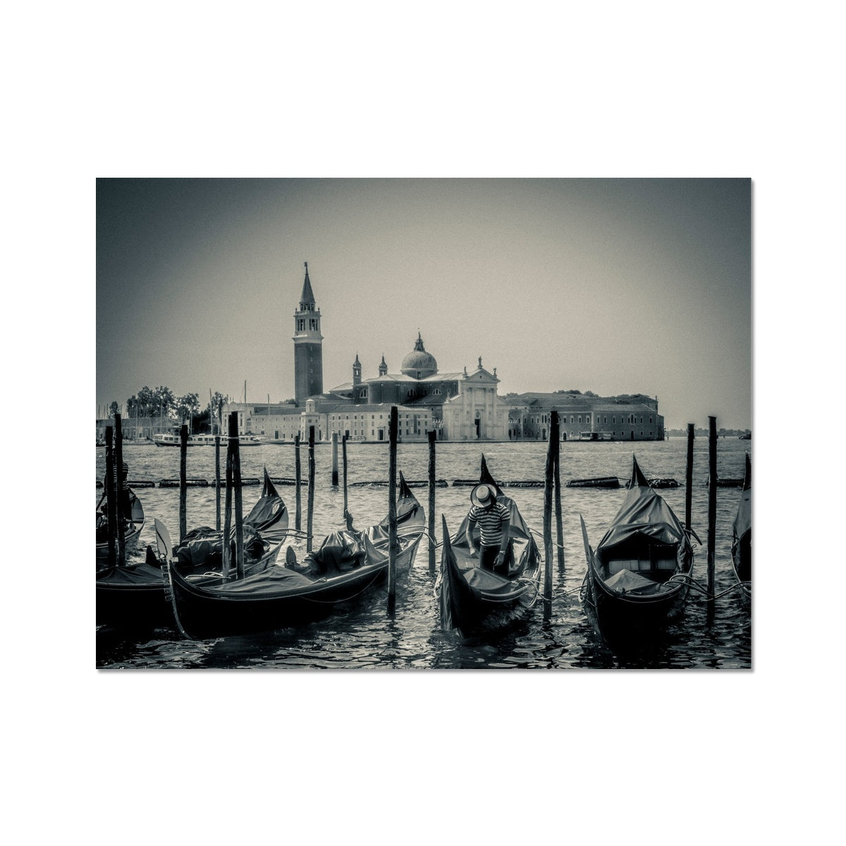 Gondolas moored in St Mark's Basin with San Giorgio Maggiore in the background. Venice, Italy. Fine Art Print