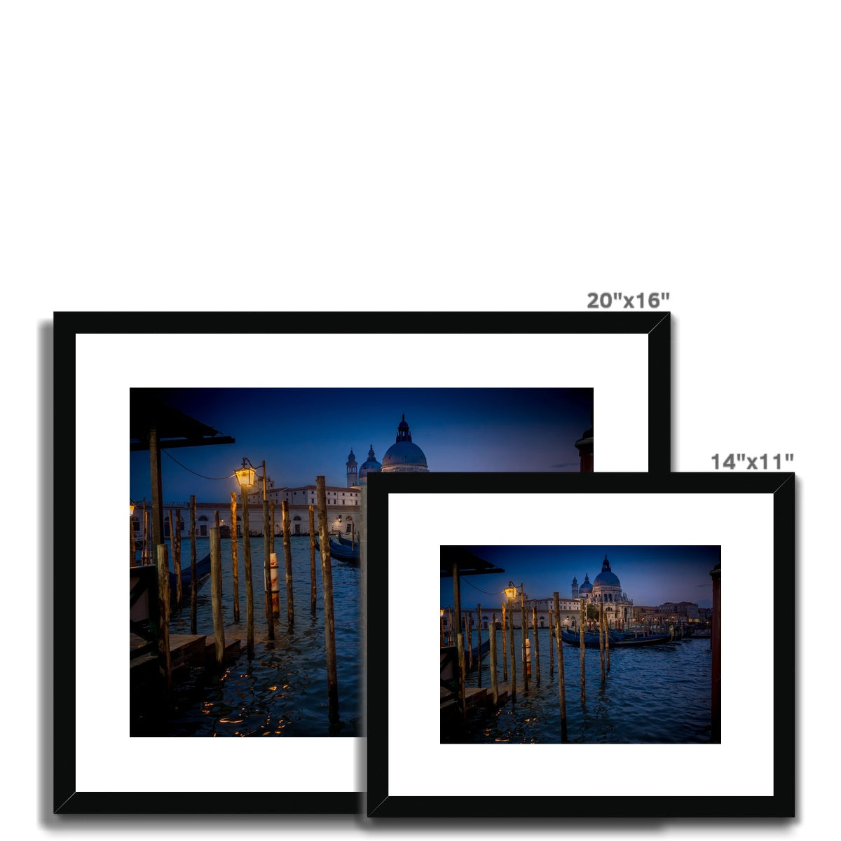 Gondolas moored for the night on the Grand Canal with the church of Santa Maria della Salute in the background. Venice, Italy. - Framed & Mounted Print