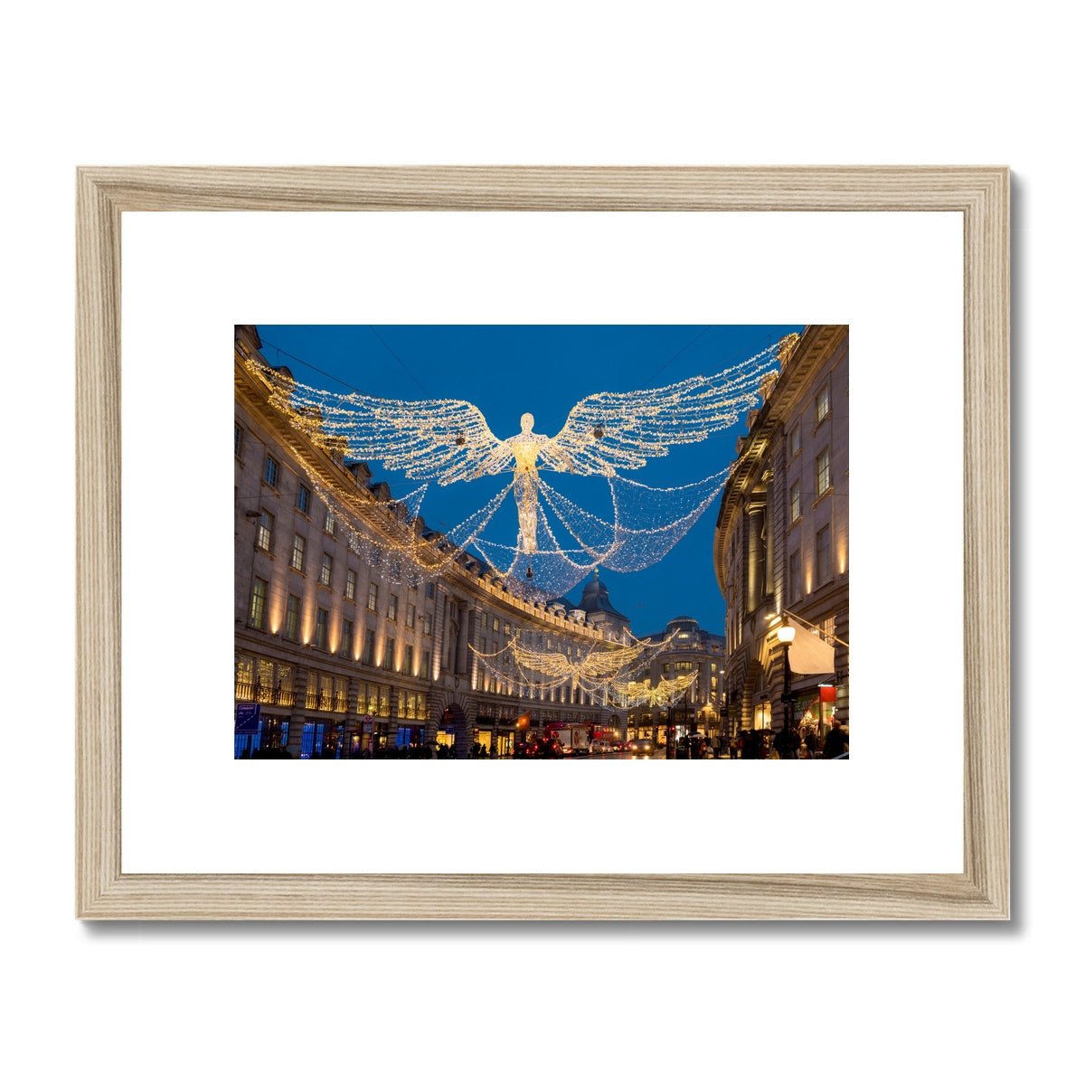 Christmas Angel illuminations in Regent Street, London, UK. Framed & Mounted Print