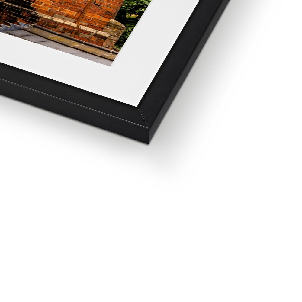 York Minster stands timeless amidst the city's rooftops. York. UK Framed & Mounted Print