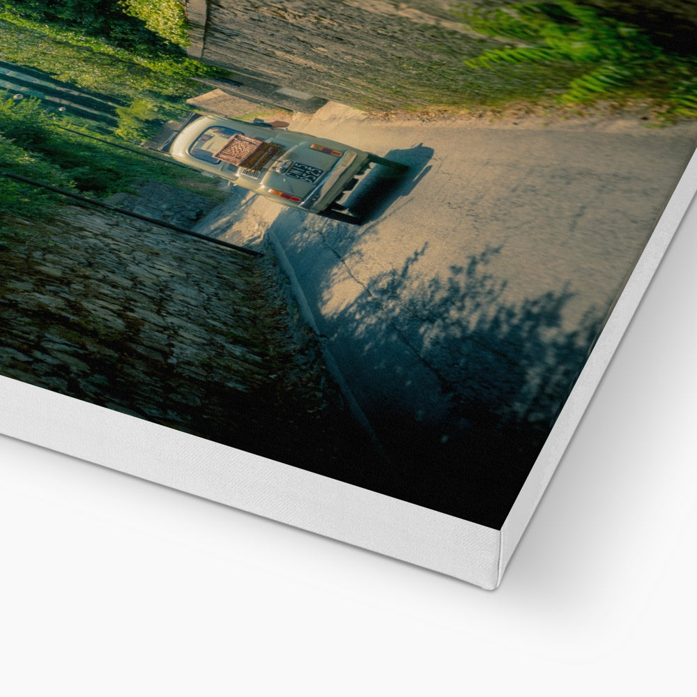 Classic Fiat 500 car driving on a road in Florence, Italy. Canvas