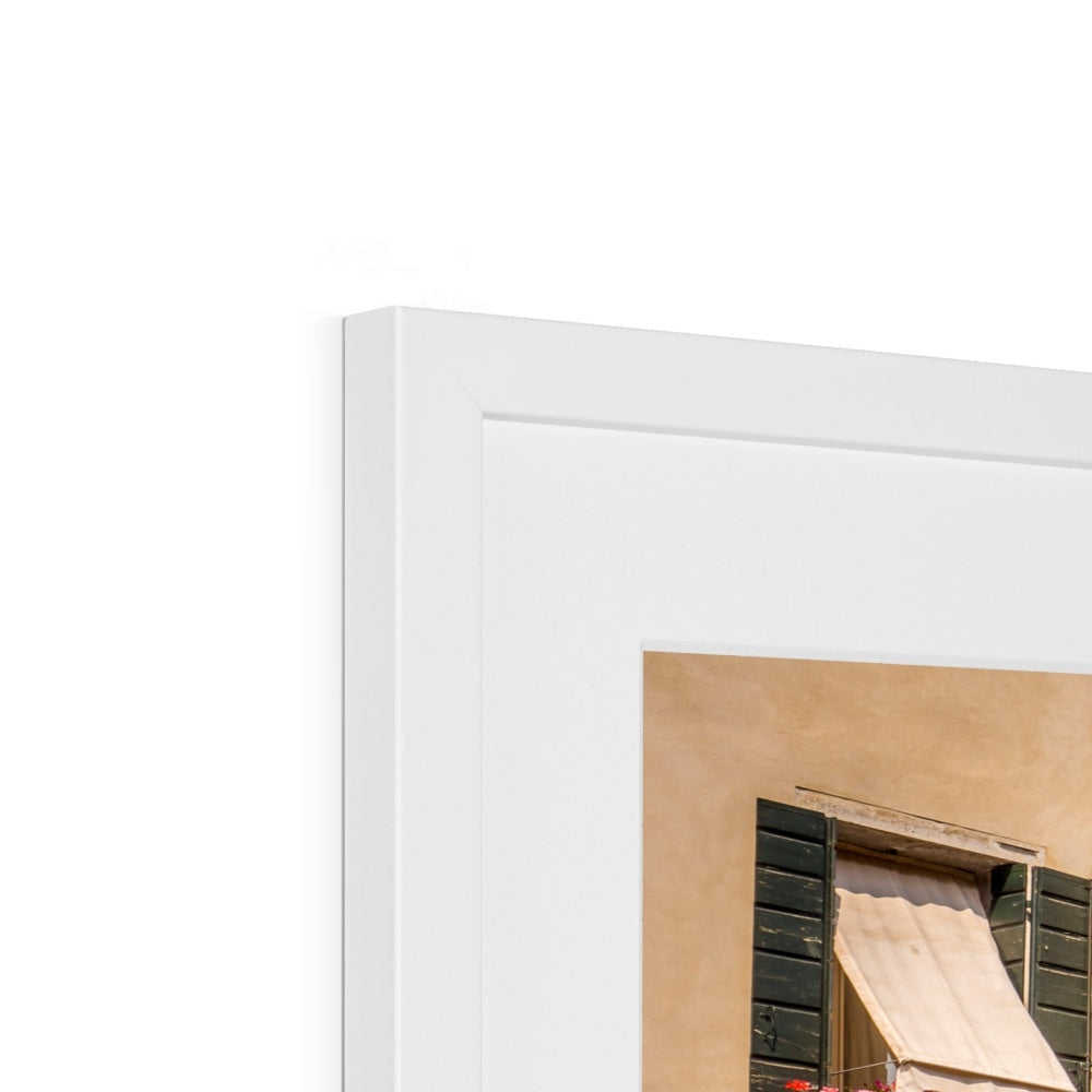 Traditional canal-side cream-rendered house with shuttered windows and window boxes. Venice. Italy. Framed & Mounted Print