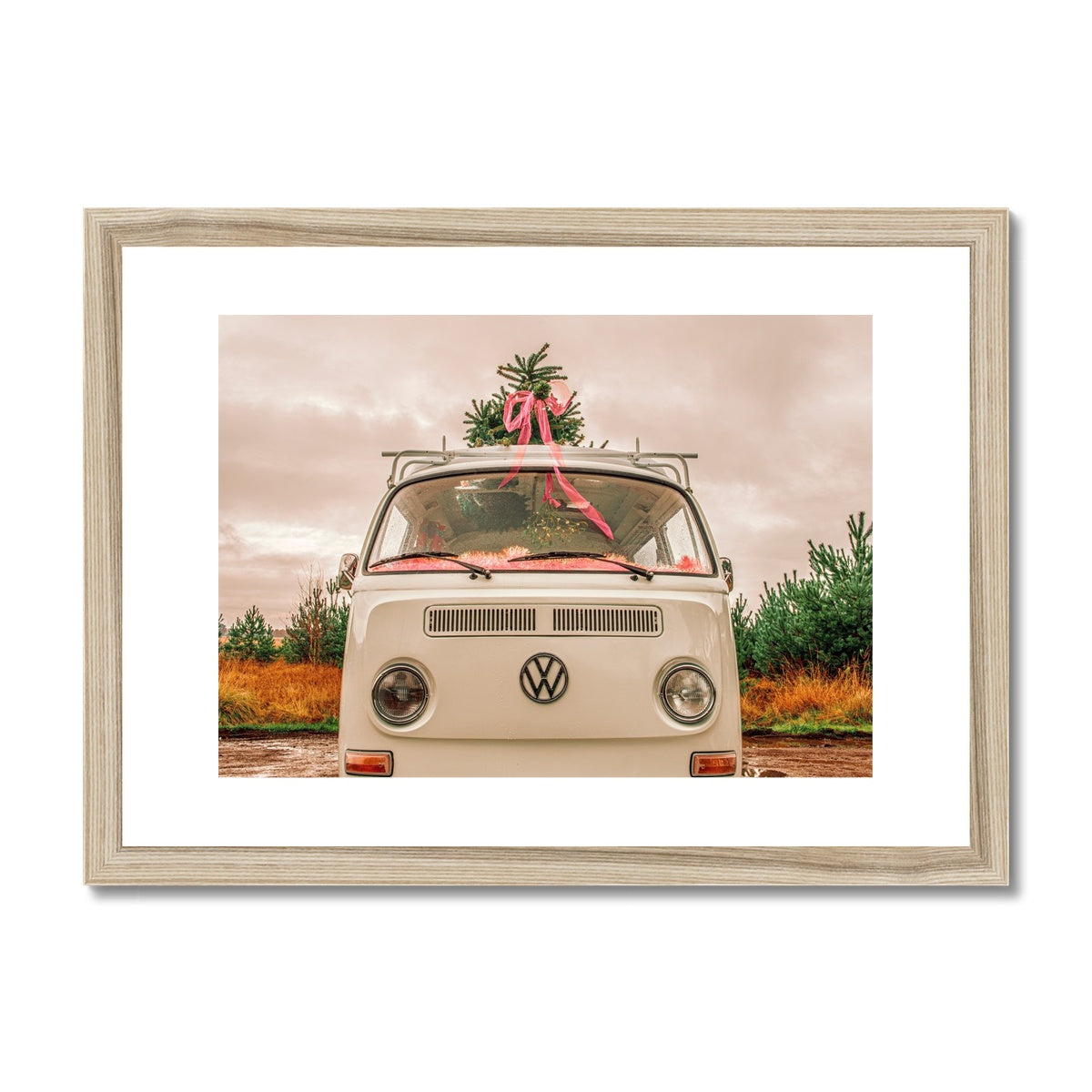 1972 VW Bay Window Campervan parked with with Christmas tree on roof. Framed & Mounted Print