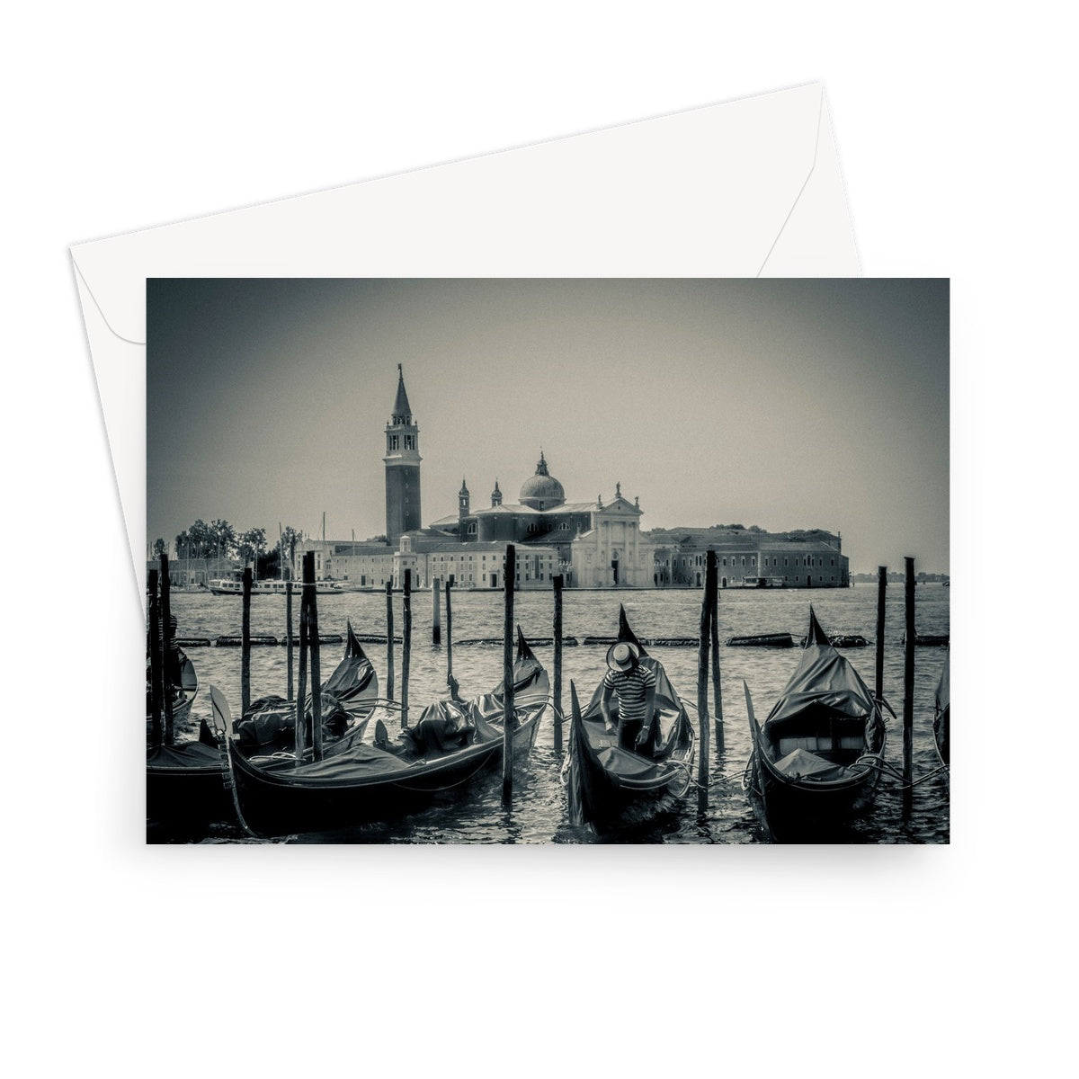 Gondolas moored in St Mark's Basin with San Giorgio Maggiore in the background. Venice, Italy. Greeting Card