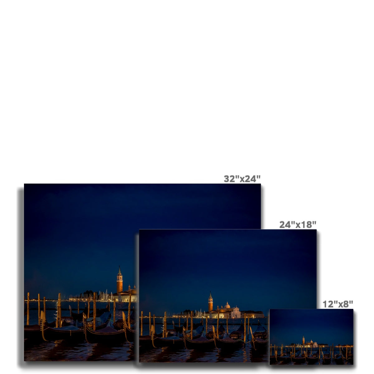 Gondolas moored in St Mark's Basin with San Giorgio Maggiore in the background at night, Venice, Italy. Canvas