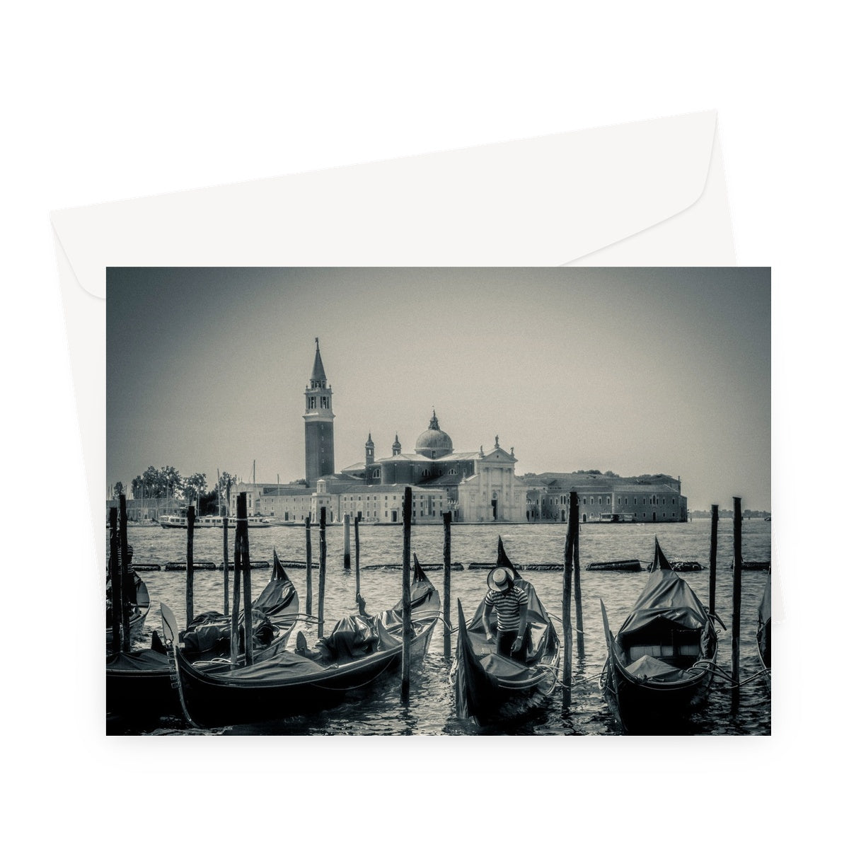 Gondolas moored in St Mark's Basin with San Giorgio Maggiore in the background. Venice, Italy. Greeting Card