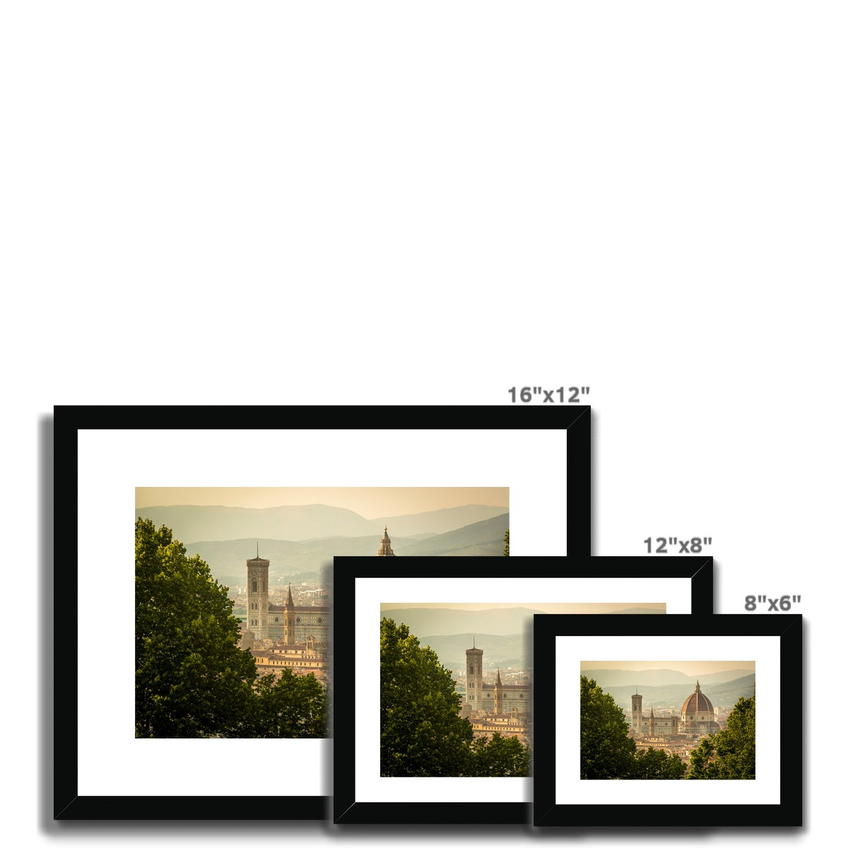 The south façade of Florence Cathedral glimpsed through the trees of San Miniato al Monte.  Italy. Framed & Mounted Print