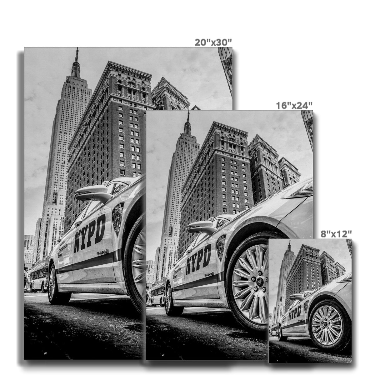 NYPD patrol car with Empire State Building on W 34th St, New York City, USA. Canvas