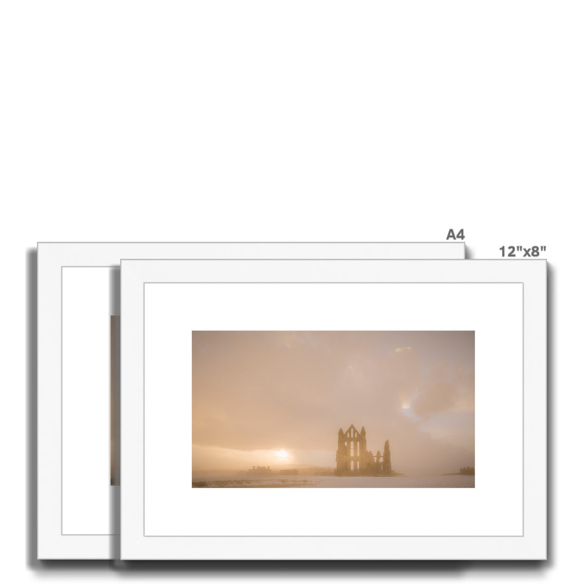 Whitby Abbey in snow, North Yorkshire. UK Framed & Mounted Print