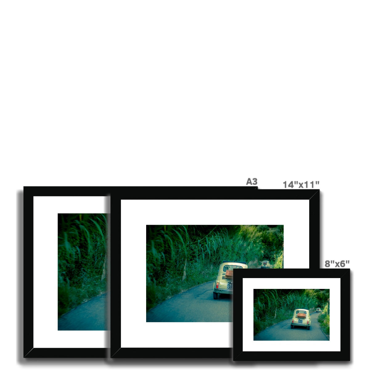 Classic Fiat 500 cars driving on a road in Florence, Italy.  Framed & Mounted Print