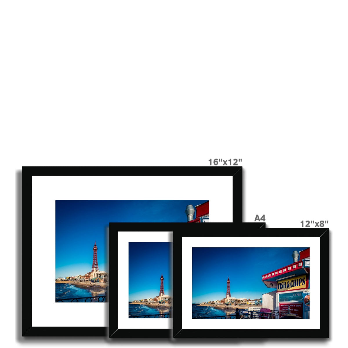 FISH AND CHIPS sign on Central Pier and Blackpool Tower. Framed & Mounted Print