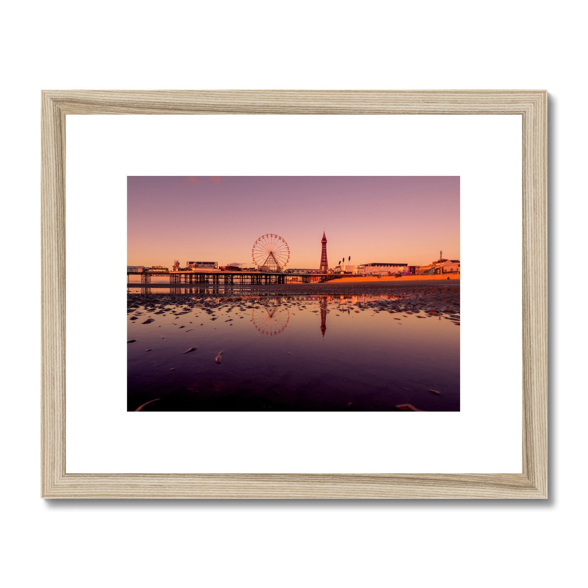 Blackpool Tower and Central Pier with beach reflections at sunset. Framed & Mounted Print