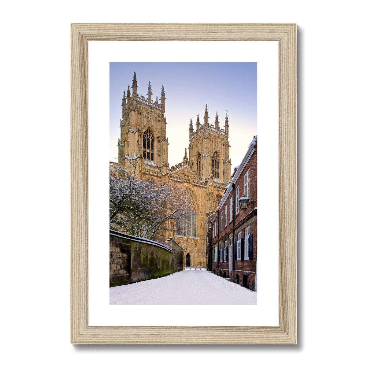 York Minster in the snow seen from Precentors Court. York, UK. Framed & Mounted Print