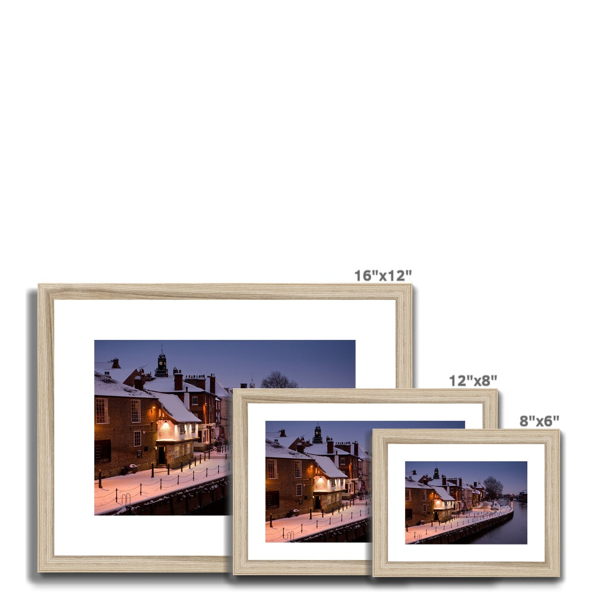 The Kings Arms pub and River Ouse in the snow at dusk, York, UK. Framed & Mounted Print