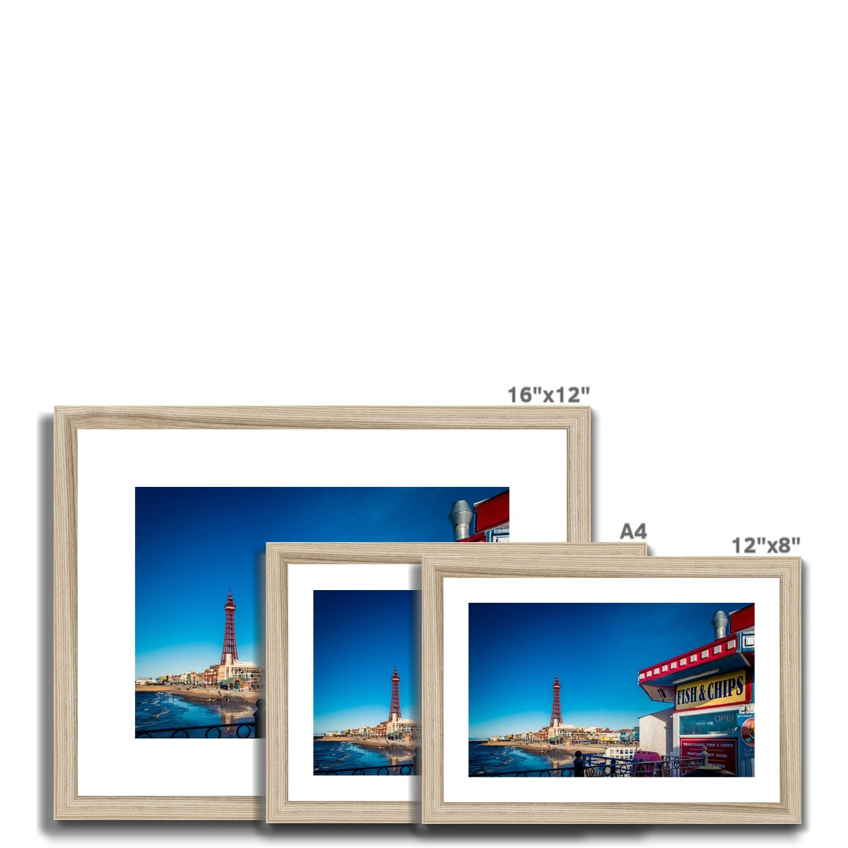 FISH AND CHIPS sign on Central Pier and Blackpool Tower. Framed & Mounted Print