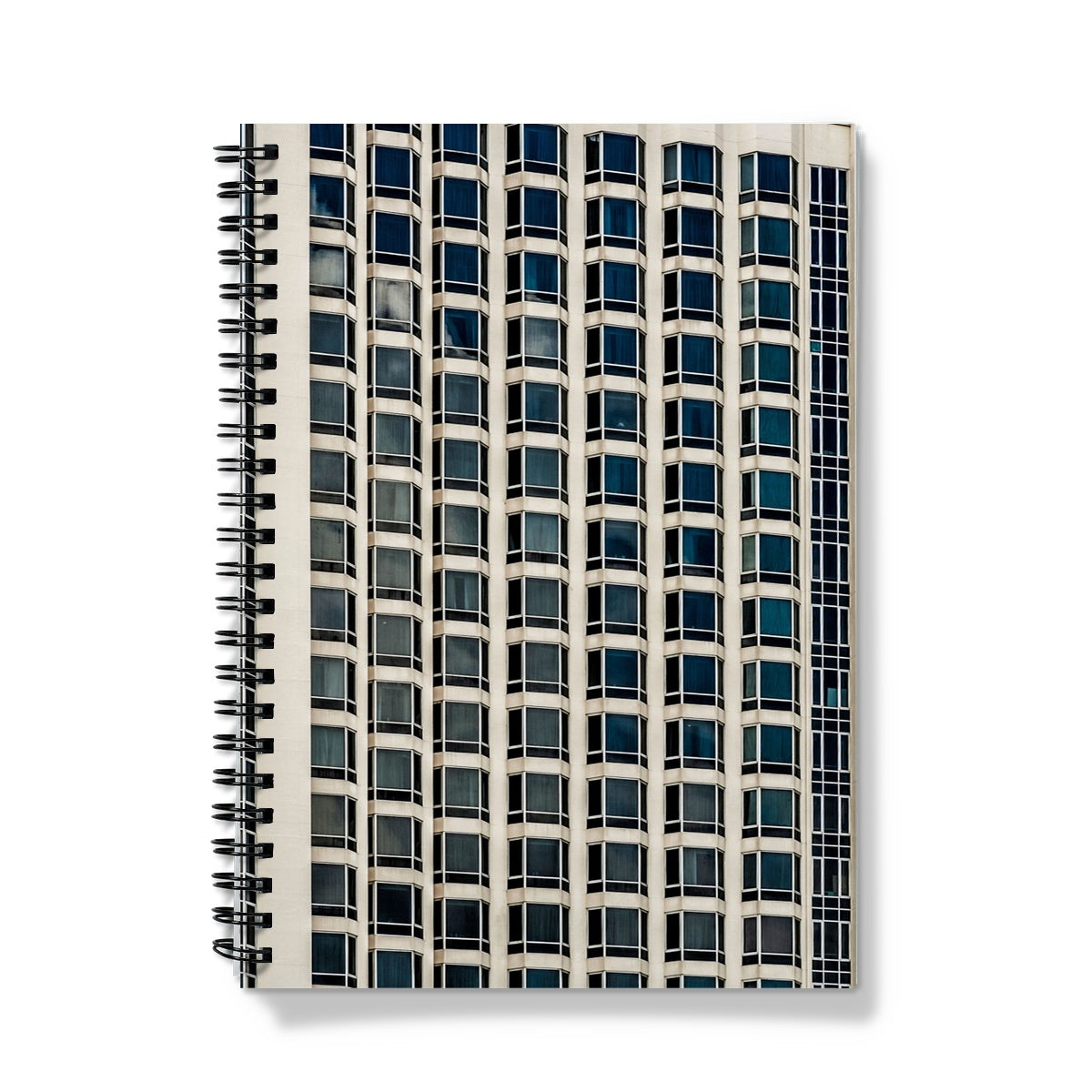 Symmetrical pattern of windows on contemporary skyscraper Notebook