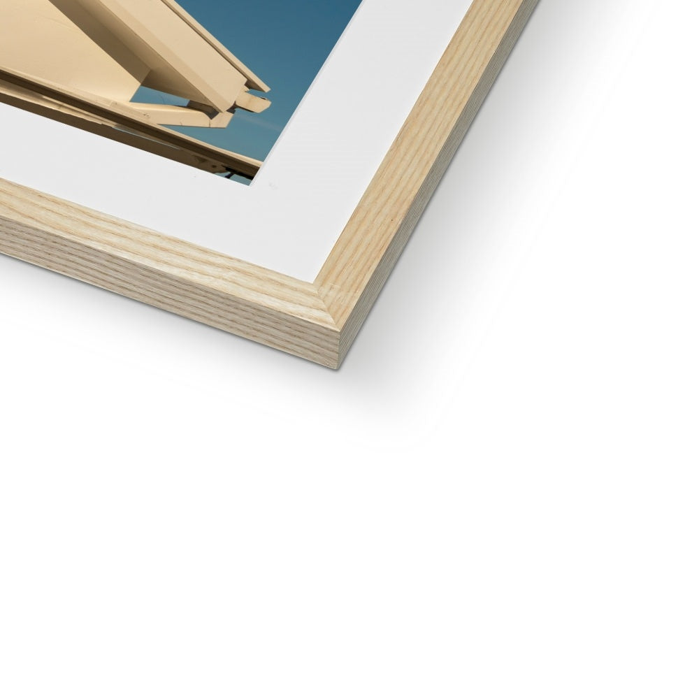 Seagull sitting on the roof of a catering kiosk selling tea and bacon sandwiches, Whitby, UK. Framed & Mounted Print