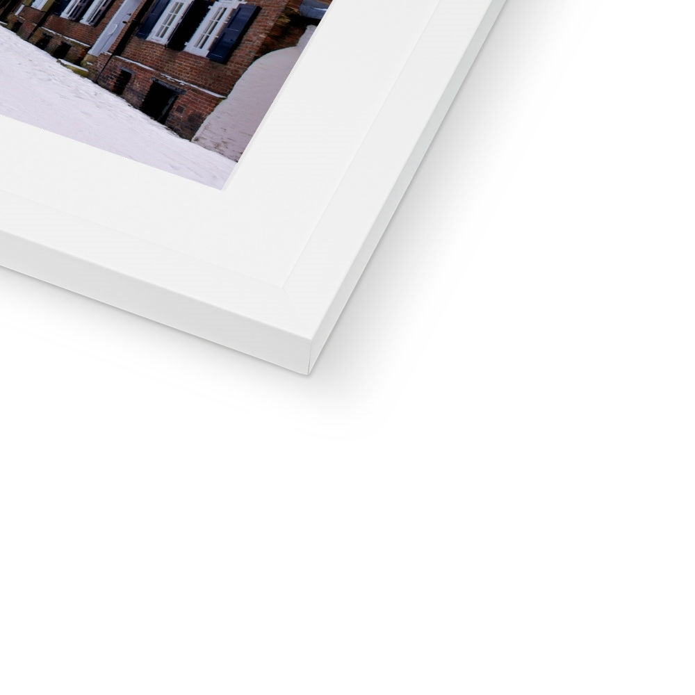 York Minster in the snow seen from Precentors Court. York, UK. Framed & Mounted Print