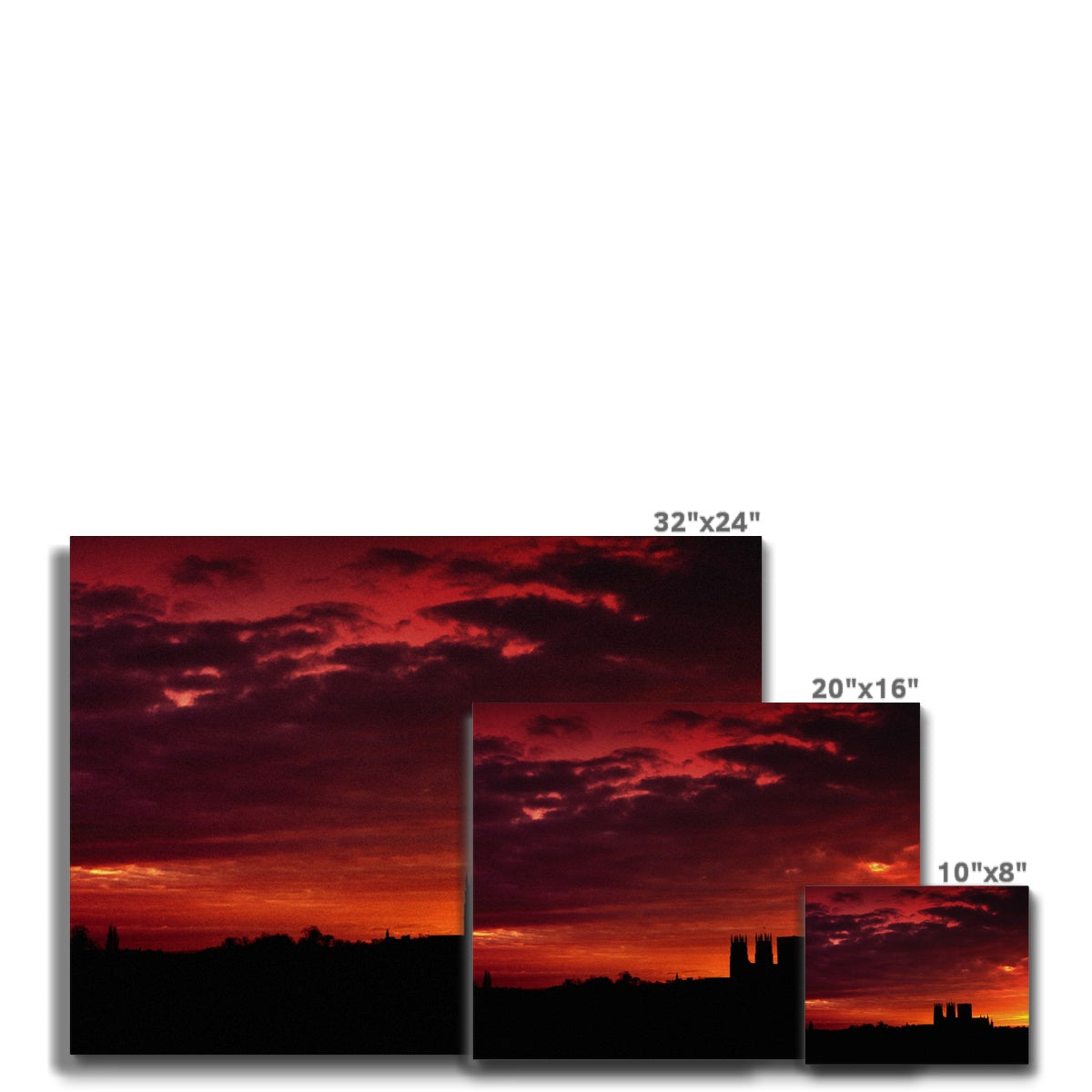 York Minster silhouetted against an orange sky at sunrise Canvas