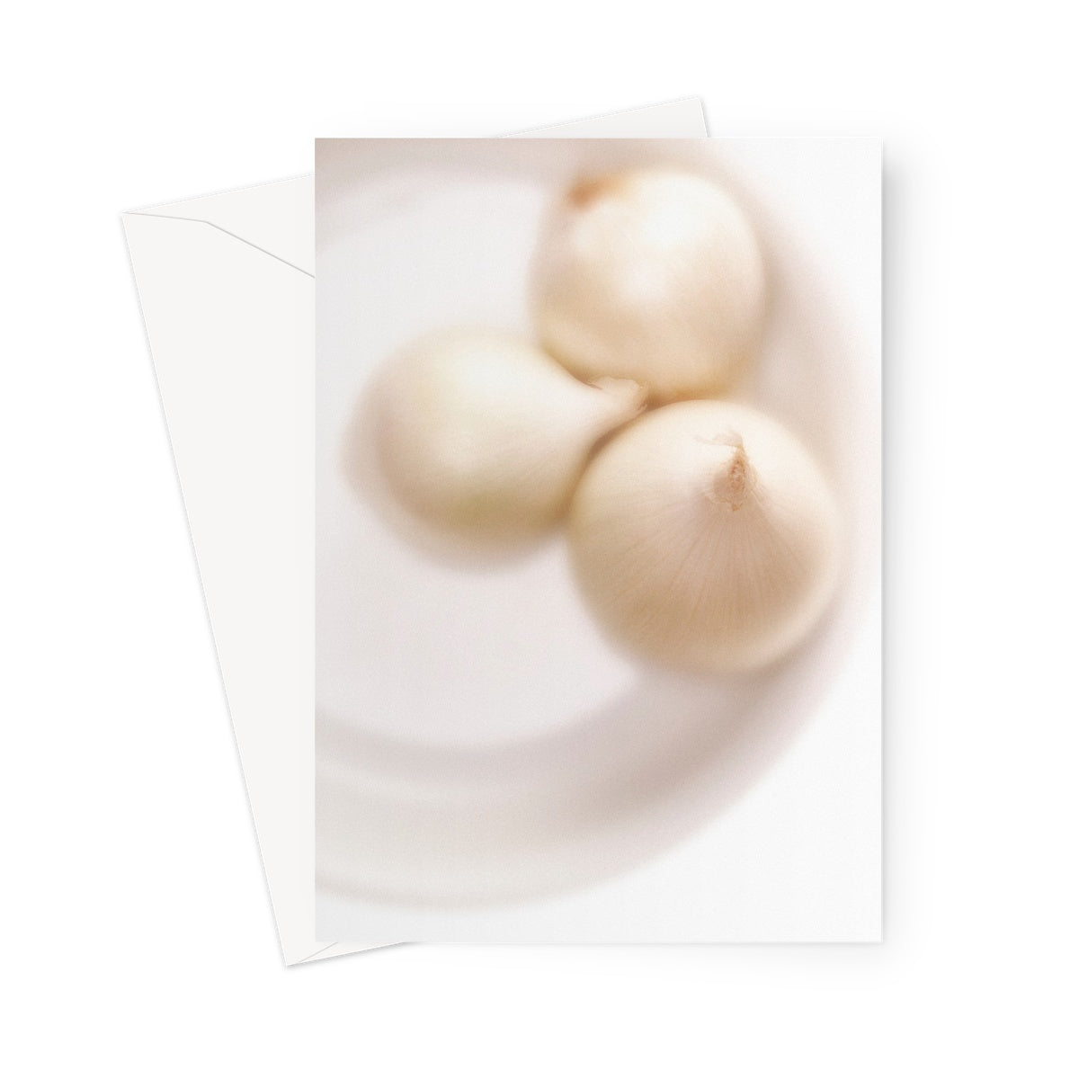 Three white onions on white plate Greeting Card
