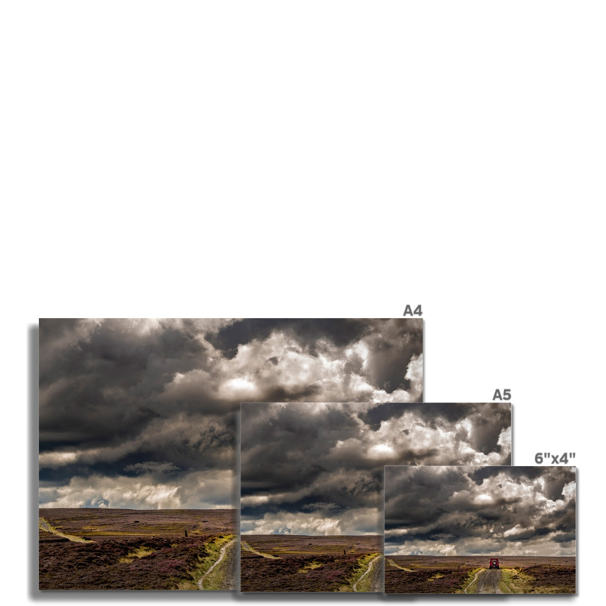 Red Land Rover Defender 110 4WD car on a Green Lane track, North Yorkshire Moors, UK. Fine Art Print