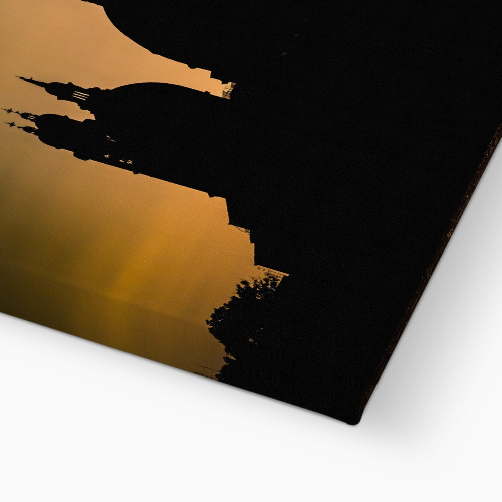 Silhouette of Santa Maria della Salute on the Grand Canal in Venice against a golden sky at sunset. Italy. Canvas