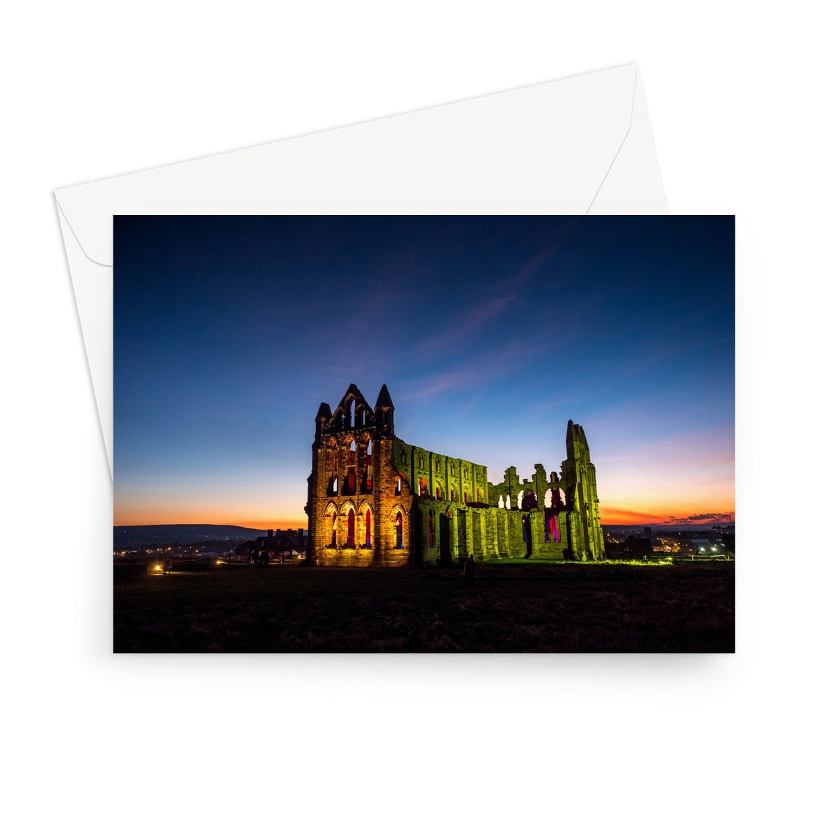Whitby Abbey illuminated for Halloween, Whitby, UK. Greeting Card