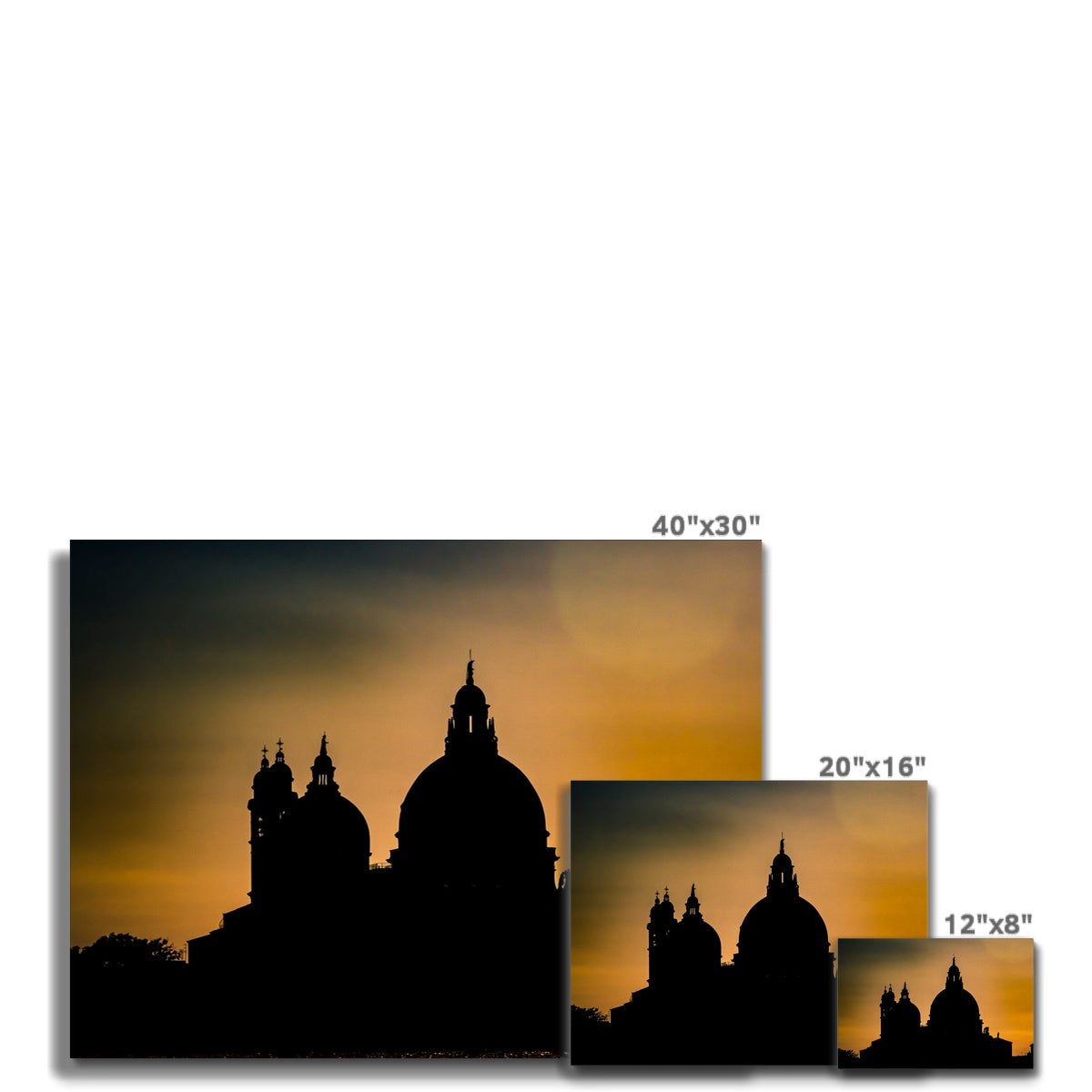 Silhouette of Santa Maria della Salute on the Grand Canal in Venice against a golden sky at sunset. Italy. Canvas