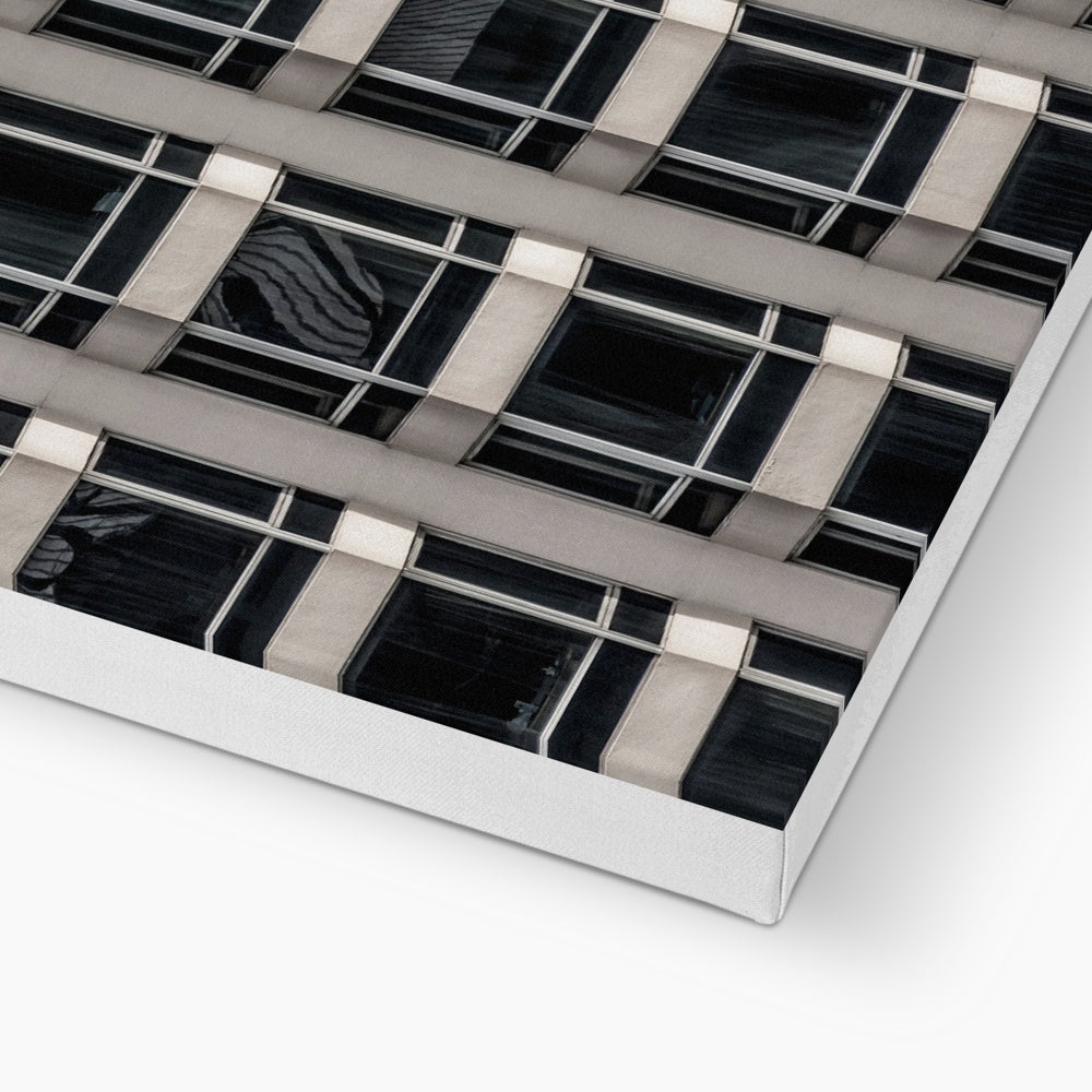 Geometric patterns of a modern urban high-rise facade Canvas