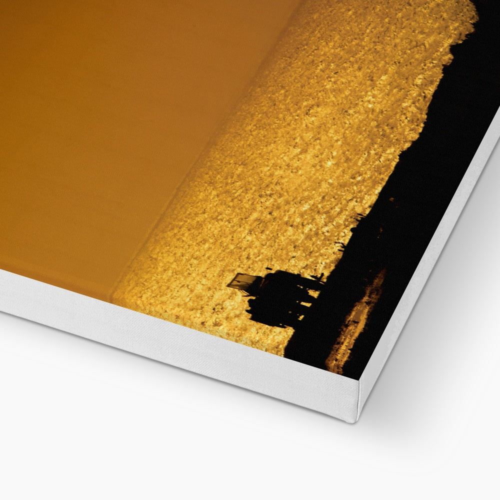 Silhouette of jeep on beach at sunset Canvas