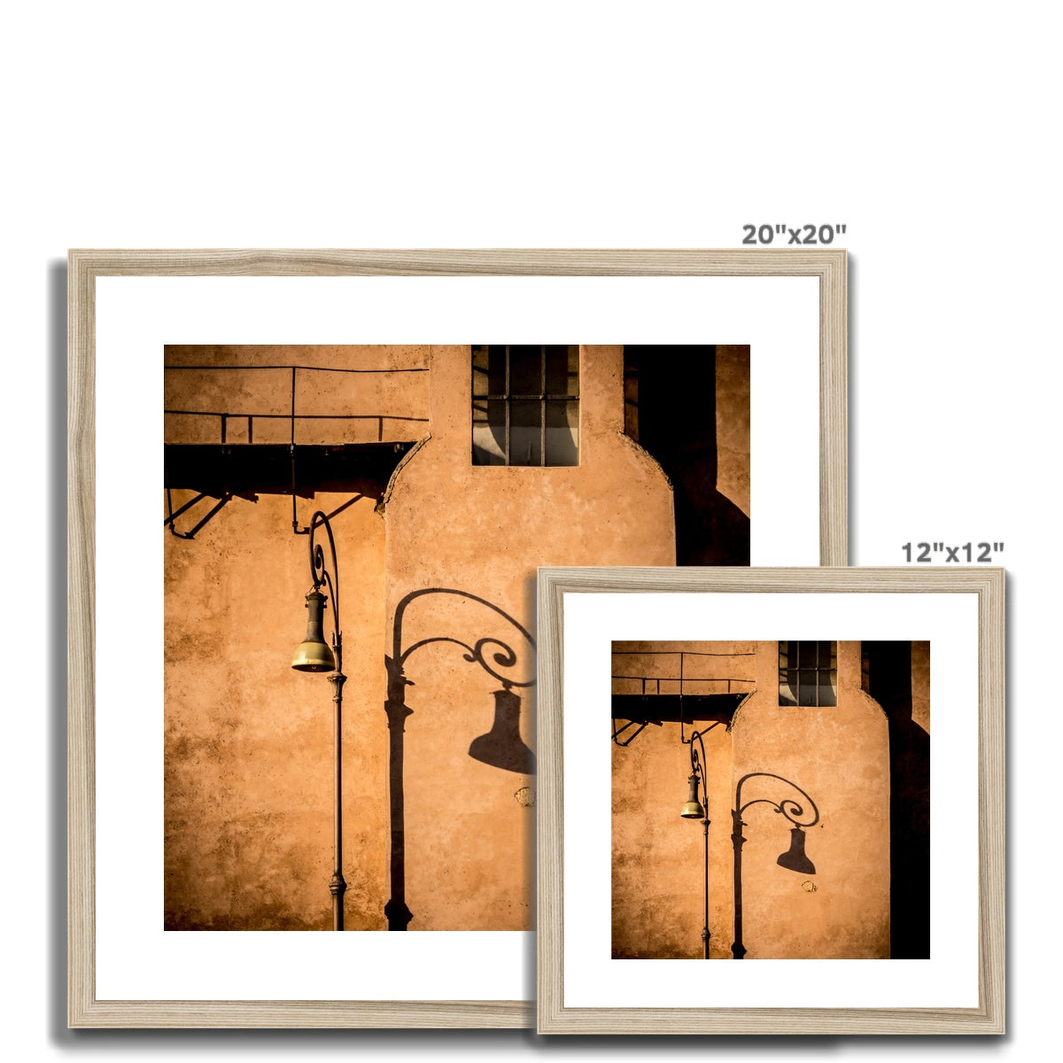 Street lamp and shadow on rendered building wall, Rome, Italy. Framed & Mounted Print