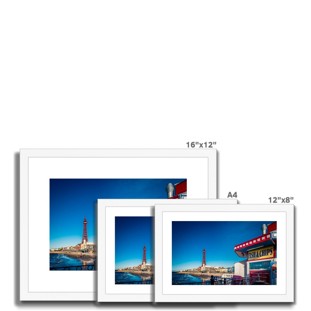 FISH AND CHIPS sign on Central Pier and Blackpool Tower. Framed & Mounted Print