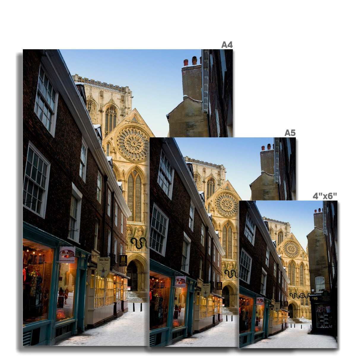 South entrance to York Minster with the Rose window seen from Minster Gates in the snow, York, UK. Fine Art Print